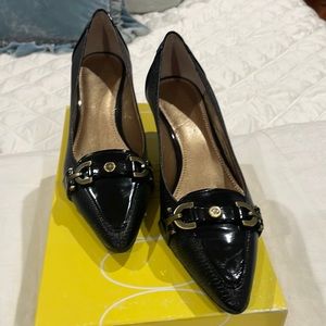 Black 2” heel pumps.